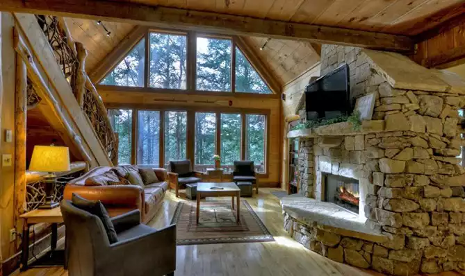 With a private hot tub, game room, and stunning views of Fightingtown Creek, Reel Creek Lodge has it all. This gorgeous custom-built cabin is located 15 minutes from Blue Ridge in the Cohutta wilderness. From 